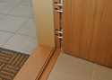 ADLO - Security door ADUO, unified colour scheme for the door surface, threshold, slat, and doorframe
