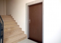 ADLO - Security door TEDUO, door surface H1428 Woodline Mocca, entrance door into an apartment