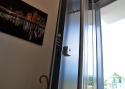ADLO - Security Termo door Tesim, glass PS370, atypical doorknob, door surface RAL 7015