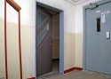 ADLO – exterior Termo door LISBEO, glass door in the communal area of an apartment house